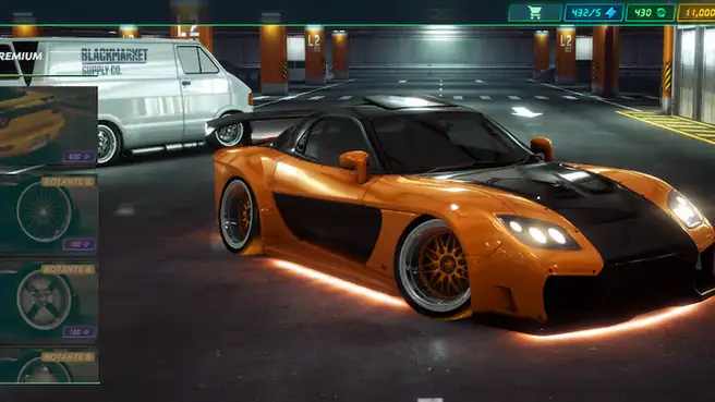 Coupé arancione in officina notturna in Static Shift Racing